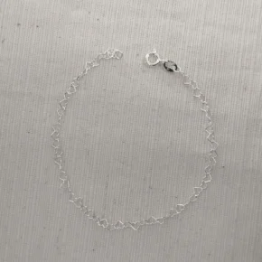 Pulsera plata corazones