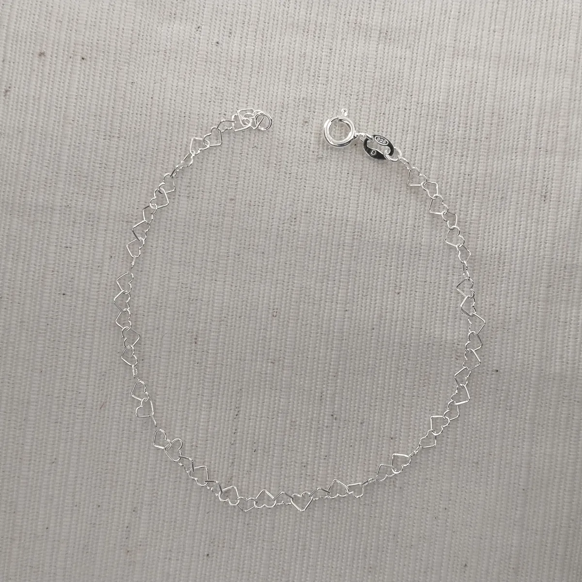 Pulsera plata corazones