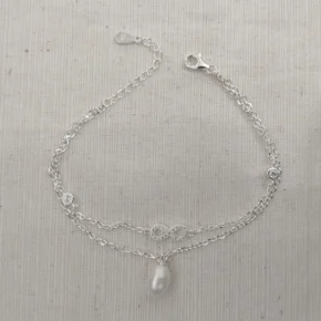 Pulsera plata y perlas