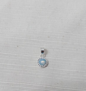 Dije plata y piedra