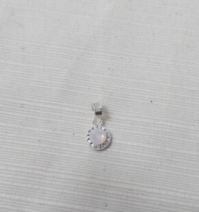 Dije plata y piedra