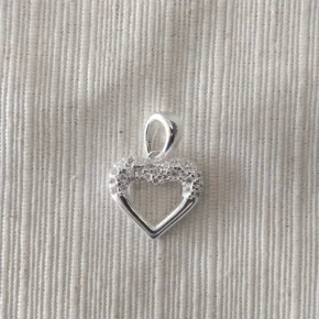 Dije plata y piedra