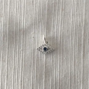 Dije plata y piedra