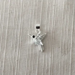 Dije plata y piedra