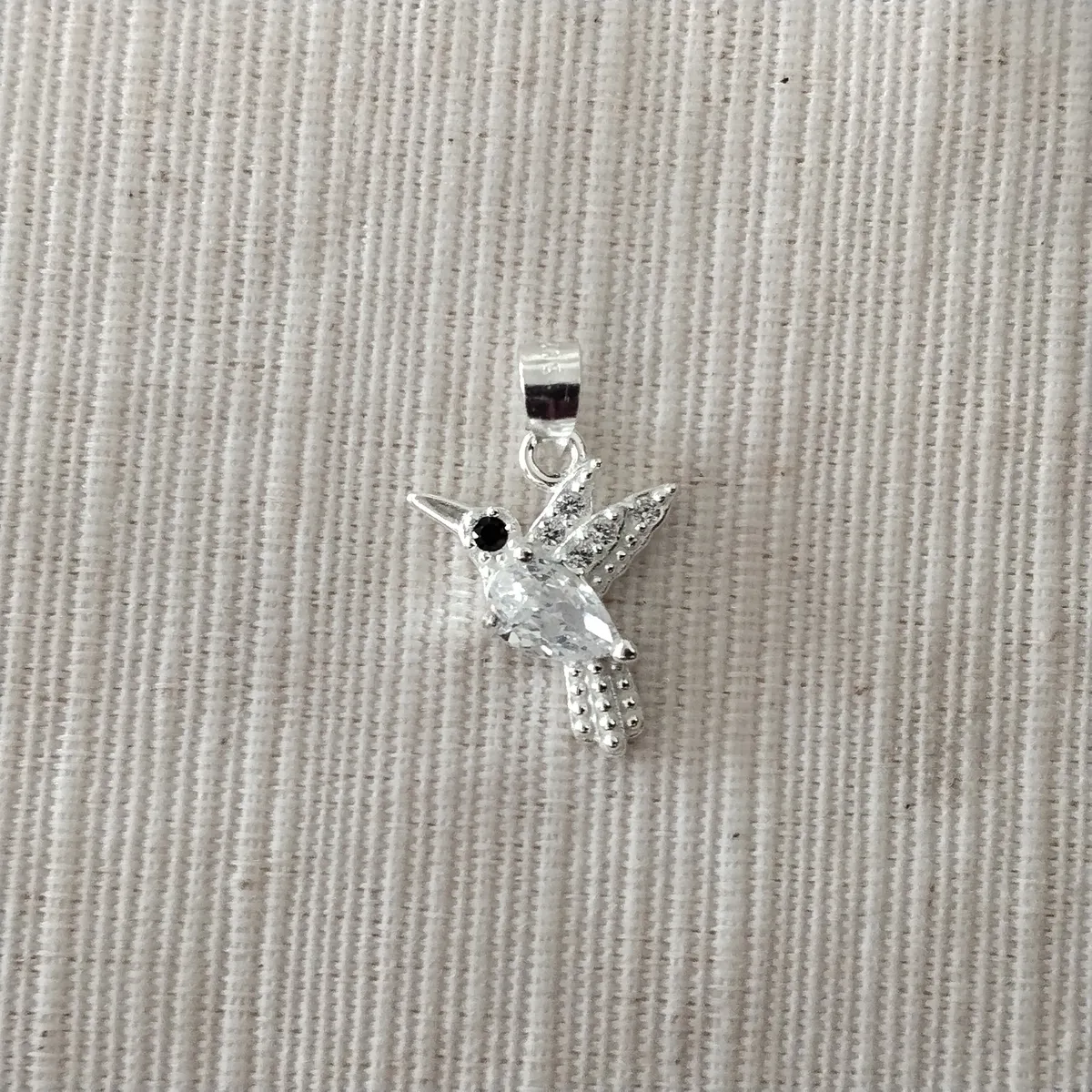 Dije plata y piedra